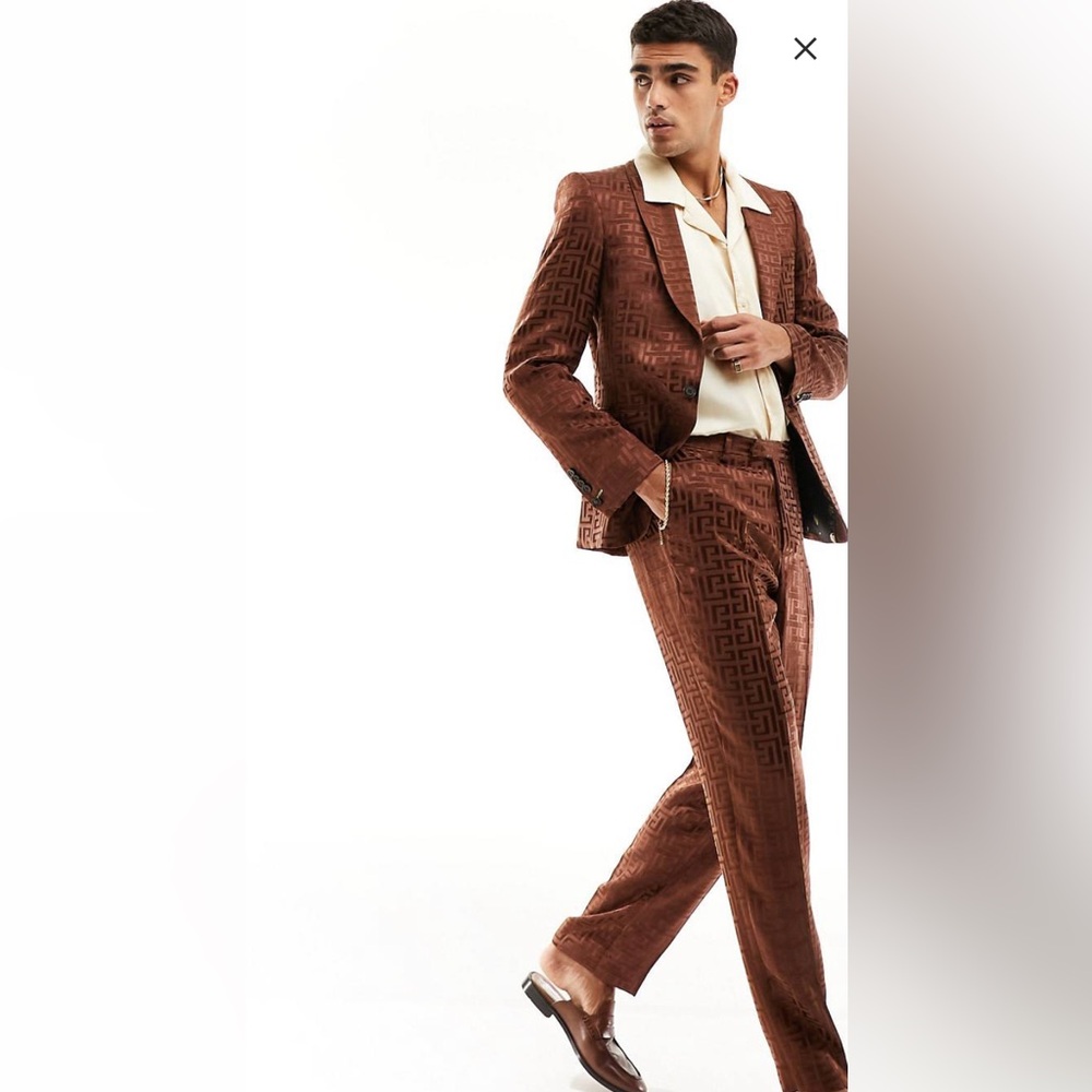 Twisted Tailor monogrammed satin suit.